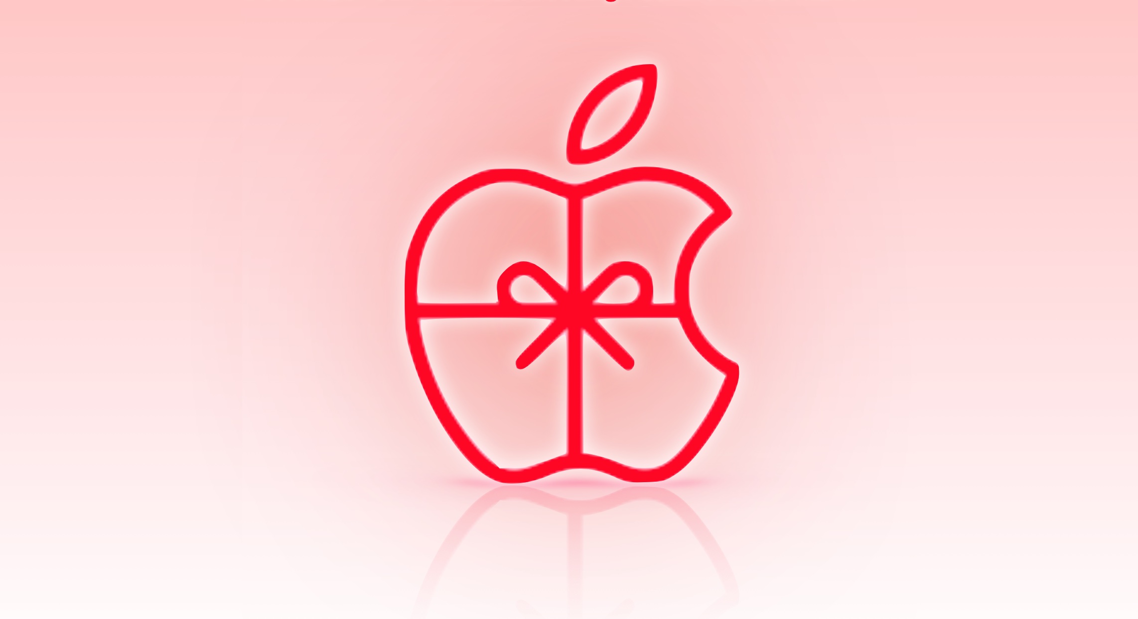 A Graphic of the Apple logo with a gift bow.